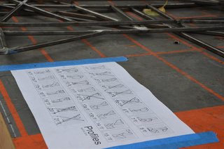 We check off the pieces that we have fabricated on the master drawing.