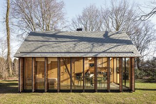 The west side is clad with six shutters made of horizontal, western red cedar slats that can be opened or closed with a single movement. "We wanted it to be able to feel cozy when needed," Oostenbruggen says.