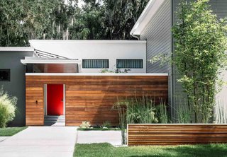 An enclosed courtyard, bordred by ipe, is arguably the most distinctive feature of the house that the Phil Kean Design Group created for a family in Winter Park, Florida.