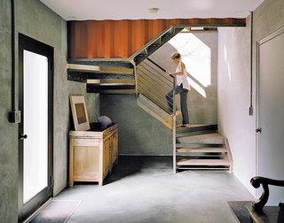 The couple connected several of the shipping containers, hollowing out the sides to form large, open living areas. "I’ve always been a loft guy," says Mathesius.