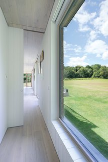 With expansive EcoHaus Internorm windows, the space feels larger than its 1,400 square feet.
