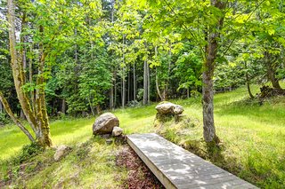 An Off-the-Grid Island Home for a Seattle Music Producer - Photo 4 of 16 -