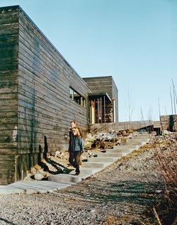 This Modern Cabin Is the Ideal HQ For a Family in Alaska - Photo 1 of 19 - A series of charred modern boxes, the home Petra Sattler-Smith and Klaus Mayer designed for Martin Buser and Kathy Chapoton, is organized around views of the Alaskan landscape.