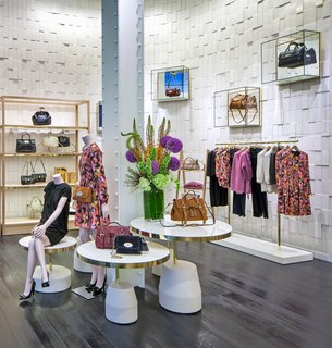 The entrance to Mulberry's Grant Avenue boutique is colorful with local blooms and their latest handbag collection. Photo courtesy of Mulberry.