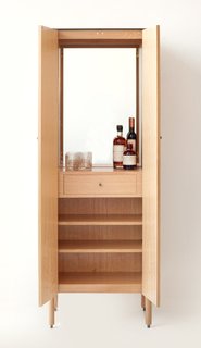 The cabinet opens to reveal a bar station. For teetotalers—or those lacking closet space—there's also an armoire version of the cabinet. For more information, visit Egg Collective's website.