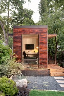 Floor-to-ceiling windows allow for an intimate connection with outdoor spaces.