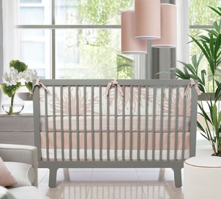 Modern parents who want to include pink into their nursery design will love the new blush colored bedding from Olio, which evokes the sweetness of a baby, but is still updated and modern. Photo from Olio.