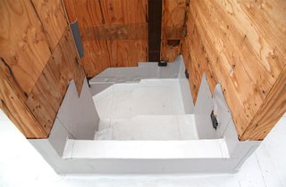 Dwell Home Venice: Part 14 - Photo 6 of 9 - An exterior staircase descending from one of the roof gardens. The stair treads will be installed later but first the waterproofing goes in. Here the Versico PVC membrane seals the stair area before the Tyvek and other paper wrap is installed on the walls.