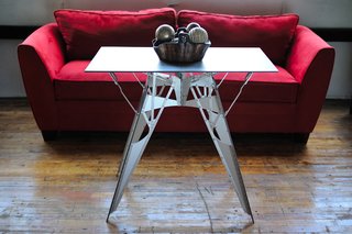 The Cricket table by Folditure is made from aluminum.