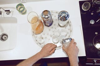 Stacey and Doug get down to business making drinks. Photo by: JUCO