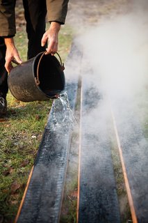 To char his boards, Weijnen built a brick oven to accommodate two six-foot-long larch wood boards at a time. After removing the planks from the brick oven, Weijnen doused them with water if the fires didn't go out on their own.