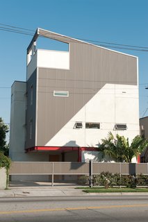 The exterior of Jayna Cooper's house in Los Angeles. "As I was designing my house I kept in mind standard lumber and plywood sizes so that there would be minimal waste," she says. "When choosing materials, I did basic research on cost per square foot and picked out some of the least expensive materials in the building industry. Basic, inexpensive stuff like corrugated sheet metal, stucco, and drywall can look really great if it’s incorporated into the design in a modern and well-thought-out way."
