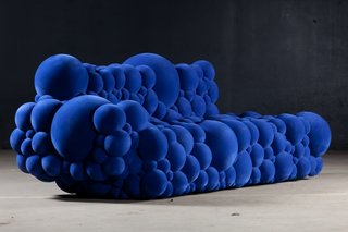De Ceulaer's Mutation sofa is made of foam spheres coated with a velvet-like rubber powder.