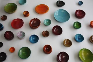 A colorful crop of Balloon Bowls, each made from dyed synthetic plaster cast within a balloon.