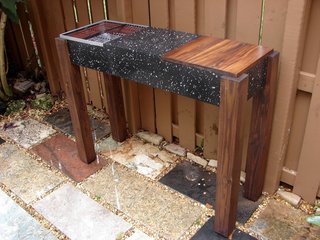 Here's a peek at the finished product. Says Marques: "The idea was to create three symmetrical squares: the grill, the granite top, and the cutting board."