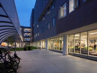 Greiner Hall at University of Buffalo, designed by Cannon Design, boasts floor tiling made from recycled soda bottles, man-made ponds for recycling greywater, electrical outlets that are wheelchair-height accessible, and lounge-style classrooms and meeting areas.