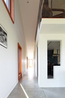 A Sustainably Built Home in Rural Ontario - Photo 11 of 16 - "There’s not a single place where you’re not aware of the larger landscape," Moffitt says. "The double-height living room is such a generous space that it feels big."
