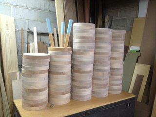Open Studios at City Modern - Photo 16 of 26 - A stack of circular tops lay in wait for their futures as colorful milking stools.
