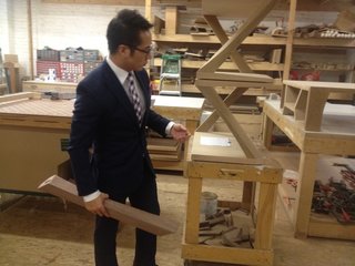 Open Studios at City Modern - Photo 18 of 26 - Luxury furniture brand Hellman Chang is well known around the borough of Brooklyn and beyond. Here, Eric Chang presents a soon-to-be polished Z table. Each leg of the table is shaped by hand in Brooklyn, resulting in an arresting sculptural piece.
