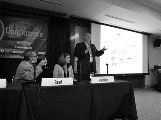 Thinking Beyond LEED at SXSW Eco - Photo 3 of 3 - Blair McCary addresses the crowd at SXSW Eco. Bill Reed and Paula Vaughan are seated.