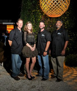 Dwell Party Highlights: Celebrating Prefab Design at SXSW Eco - Photo 17 of 20 - The Sett Studio crew, including designer Kimber Reed and founder Mike Speciale (center right). Wardrobe for Reed and Dwell was provided by sustainable fashion house Allison Parris.