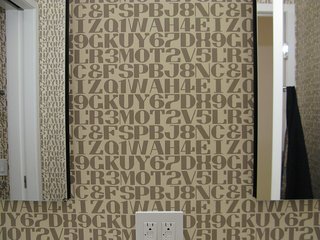 City Modern Home Tours: Brooklyn - Photo 7 of 51 - More patterned wallpaper in the bathroom.