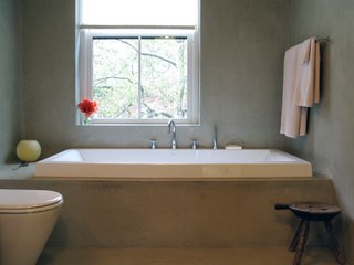 City Modern Home Tours: Brooklyn - Photo 8 of 51 - The polished concrete inside the bathroom on the top floor has an amazingly smooth texture and pleasant slightly green tone.