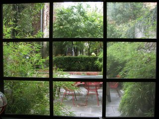 City Modern Home Tours: Brooklyn - Photo 28 of 51 - Here's a view of the garden through custom steel windows fabricated for the house by the owners' artist friend.