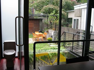 City Modern Home Tours: Brooklyn - Photo 42 of 51 - View of the garden and bath from the dining room.