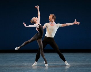 Janie Taylor and Ask la Cour in George Balanchine's Stravinsky Violin Concerto. Designers Will Kavesh and Emrys Berkower of Token mimicked dancers' legs for the steel legs of their tables. Photo by Paul Kolnik.