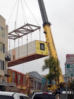 Each day four 65-foot modules were craned into place. Three modules contained a total of six units units; the fourth module contained a four-story stair atrium/elevator. This stacked up to one floor per day.