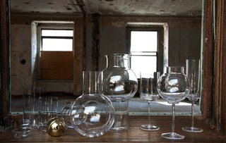 From the hand-blown tumbler set to the decanter with brass stopper, this whole set would outfit any bar cart in style. Photo by Don Freeman.