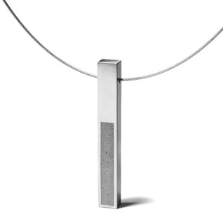 The KMP212 pendant necklacepays homage to Donald Judd's sculptures.