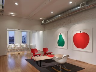 Design Army, Washington, D.C. - Photo 4 of 9 - Red, green, and white reduce the visual clutter of the office. The conference room gets plenty of natural light and the wall, coated with Idea Paint (TM) is used for brainstorming project ideas. "We get a lot of natural light. Light is really important to me, personally. I don’t perform well when I’m in a dark, enclosed space. We wanted to keep it really clean because we deal with color all day long," says Pum. Photo by: Anice Hoachlander of Hoachlander Davis Photography