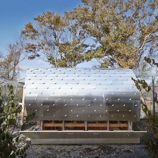 The Dos and Don'ts of Building Your Own Chicken Coop - Photo 4 of 4 - Architecture Reseach Office's 60-square-foot chicken coop streamlined a Hamptons backyard: the concept was to create a series of folded shingles, textured pieces of aluminum that would complement the more rustic aesthetic. Radiant heating, one of the structure's amenties, is a coop must-have, according to the architect.