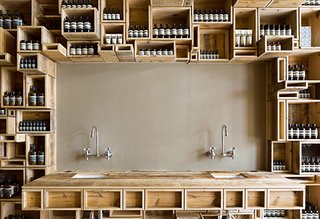 The pine box motif is repeated here at the sink as well.