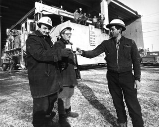 A Look Back at Habitat '67 with Moshe Safdie - Photo 1 of 6 - Builders toast the casting completion of the last box at Habitat ’67 in Montreal, Quebec.