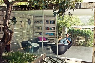 Herman Pasternak, an engineer and consultant who designs water treatment systems, is a childhood friend of Pentimento’s owner, Desirée Marín, and now rents the house. He selected woven plastic chairs from Dream Works, a local company, for his reading room because they "go with the inside-outside concept of the house."