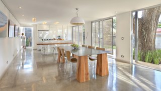 The kitchen, decorated with many of Pucci's prints, features a table Trejos designed.
