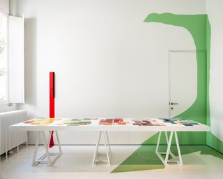 A workspace within Wenes's Antwerp house and gallery features splashes of color.