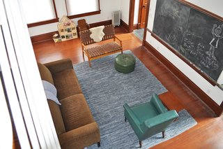 The original chalkboard remains on the wall.