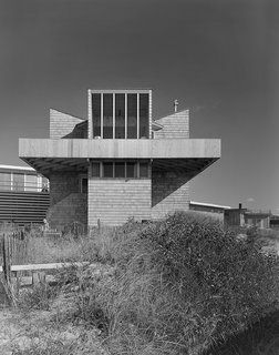 This 1965 home on Tarpon Walk updates the the shingle-style beach house so common in Long Island vernacular architecture. Delicately balanced on slender tower bases—a "spaceship" as Gifford called it—it hovers over its earthbound neighbors.