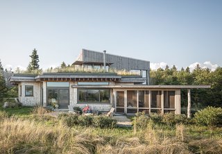 Architect Will Winkelman and landscape architect Todd Richardson collaborated with a client, JT Bullitt, to design a house that blends into its surroundings in Steuben, Maine. The green roof gives the impression that "the ground just jumped onto the roof," Richardson says.