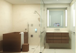 Japanese Soaking Tubs - Photo 9 of 13 - A soaking tub satisfies both "bath people" and "shower people" as bathers wash outside the tub, then soak in clean, deep hot water. The owner of this penthouse asked Roberts Hot Tubs for a teak tub next to his shower. Soaking tubs can have straight or sloping sides and can be any shape. They use more water than regular tubs, but since bathers soak when clean, it’s common to add a re-circulating heater and filter. Tub makers offer wooden lids to keep the water hot - in Japan the same water is typically used by the whole family. Photo courtesy of: Roberts Hot Tubs