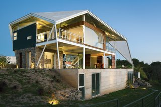 Architect José Roberto Paredes’s crowning achievement is the freestanding concrete roof that wraps around the structure.