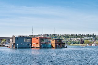 This Couple Merrily Floats Along in Seattle - Photo 1 of 3 -