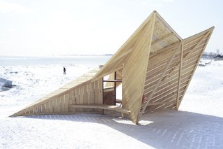 Driftwood Throne: DM_Studio (London)Standing like a sentry on the beach, this angular sculpture assembled from reused timber hides a small bench below a raised viewing platform.