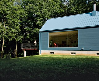 Lauren Ewing’s stylish, but unassuming shotgun-style house in Vincennes, Indiana, is set into a hill overlooking a field she has known since childhood. Read more about this home made of local materials here.