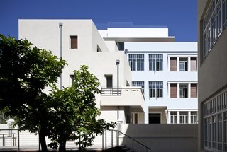 Tel Aviv is home to one of the largest neighborhoods of Bauhaus architecture, known as the White City. This building, The Norman Hotel in Tel Aviv, was originally designed as two separate apartment buildings in 1925: one half features Renaissance and oriental influences, while the other is a clean-lined, modernist structure reflective of Bauhaus design.