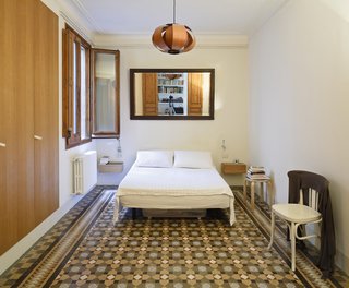 Historic Details and Playful Modernism Meet in this Stunning Barcelona Flat - Photo 7 of 8 -